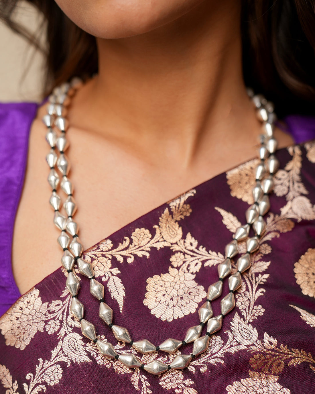 Silver dholki necklace