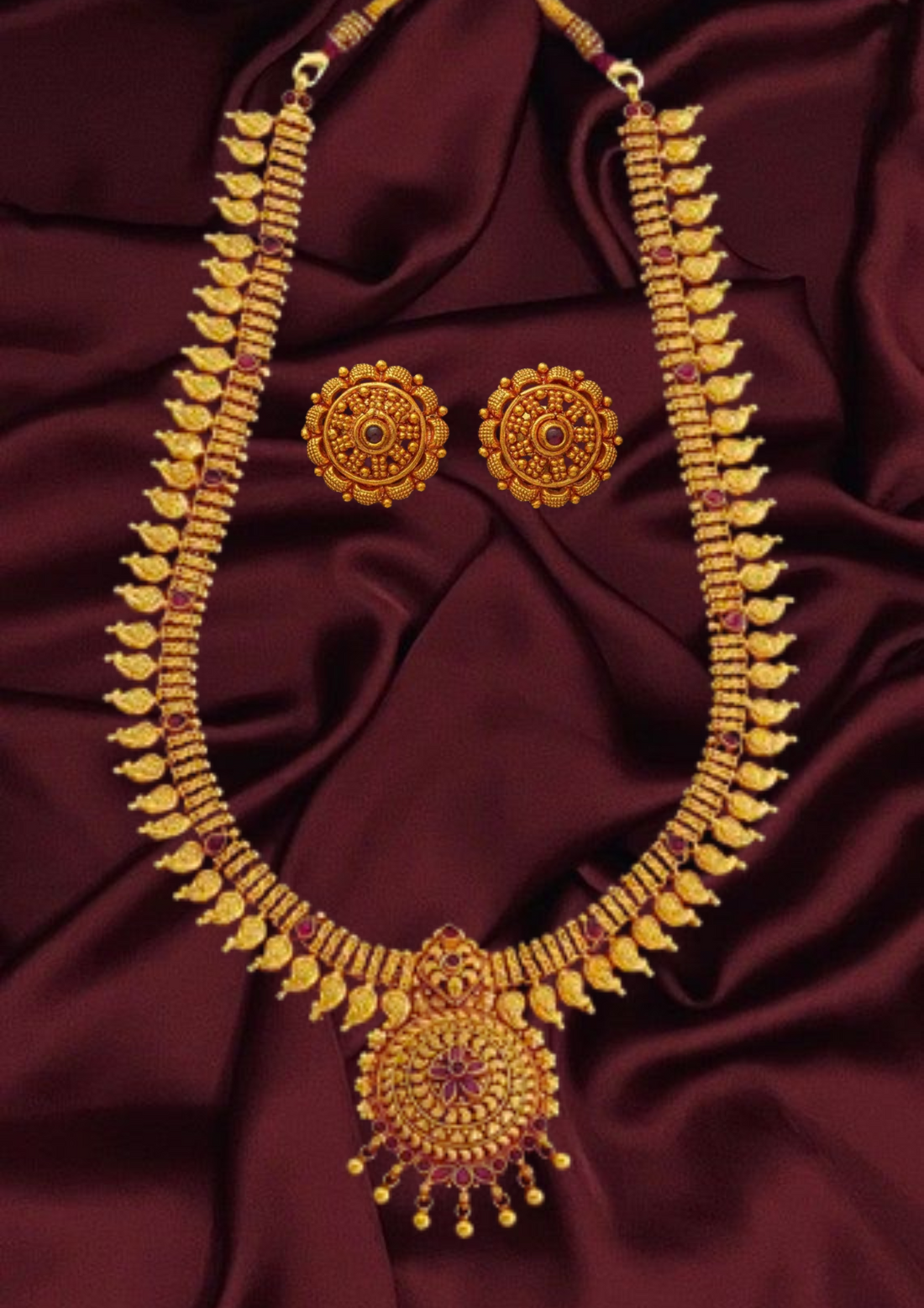 Long silver temple Necklace with spinal stone