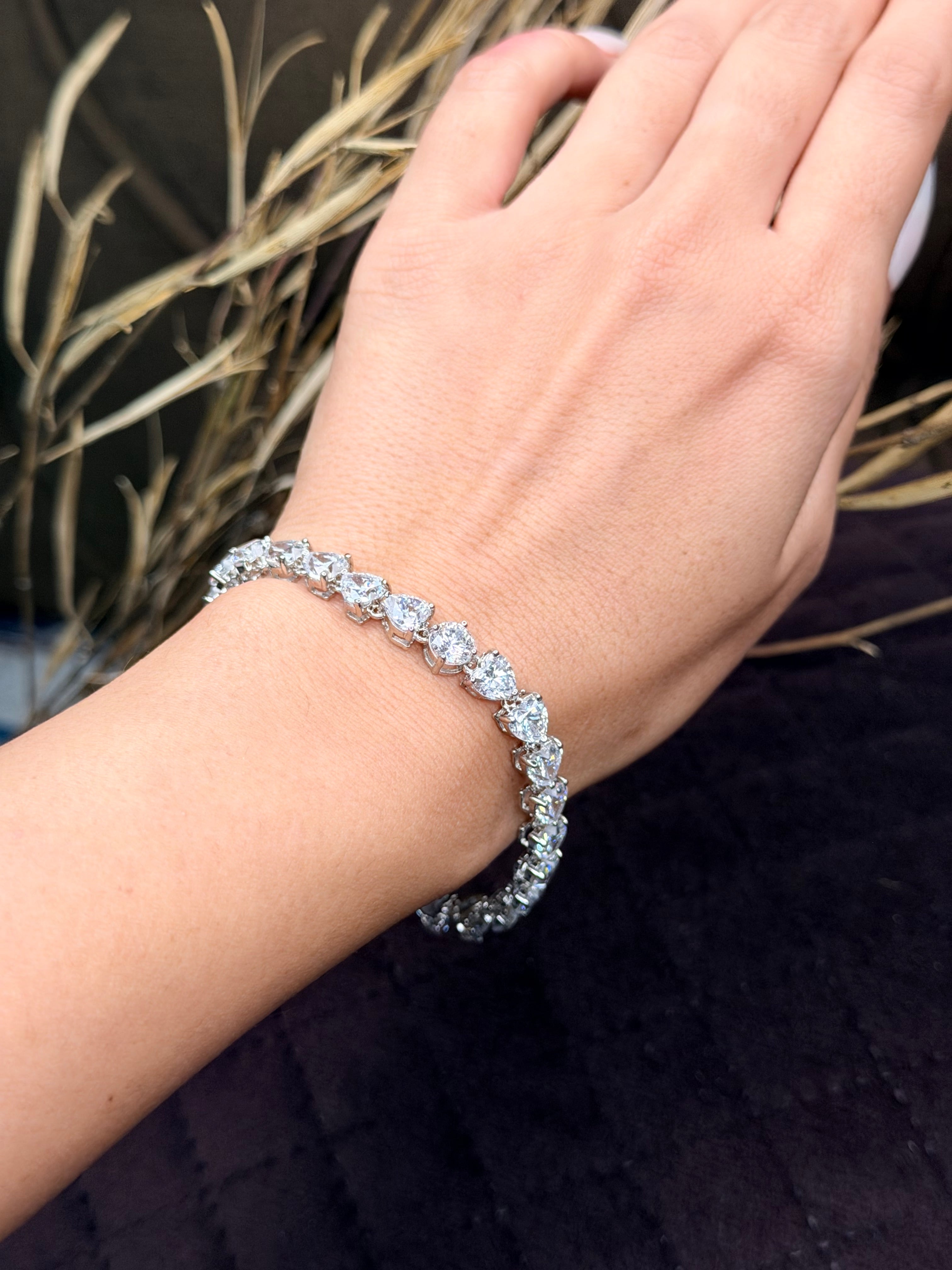 Silver heart shaped diamond tennis bracelet