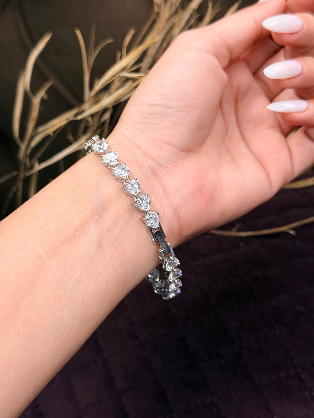 Silver heart shaped diamond tennis bracelet