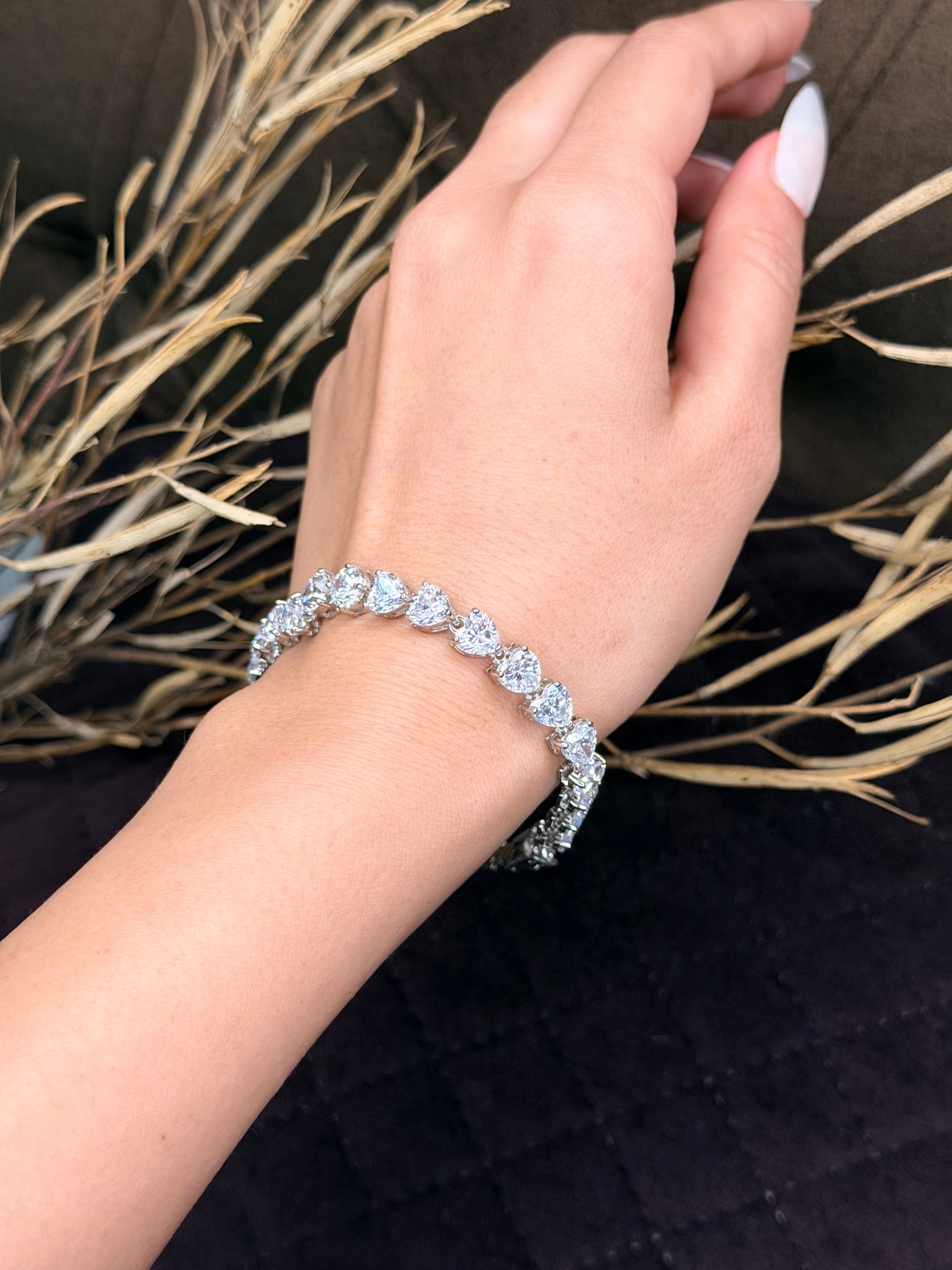 Silver heart shaped diamond tennis bracelet
