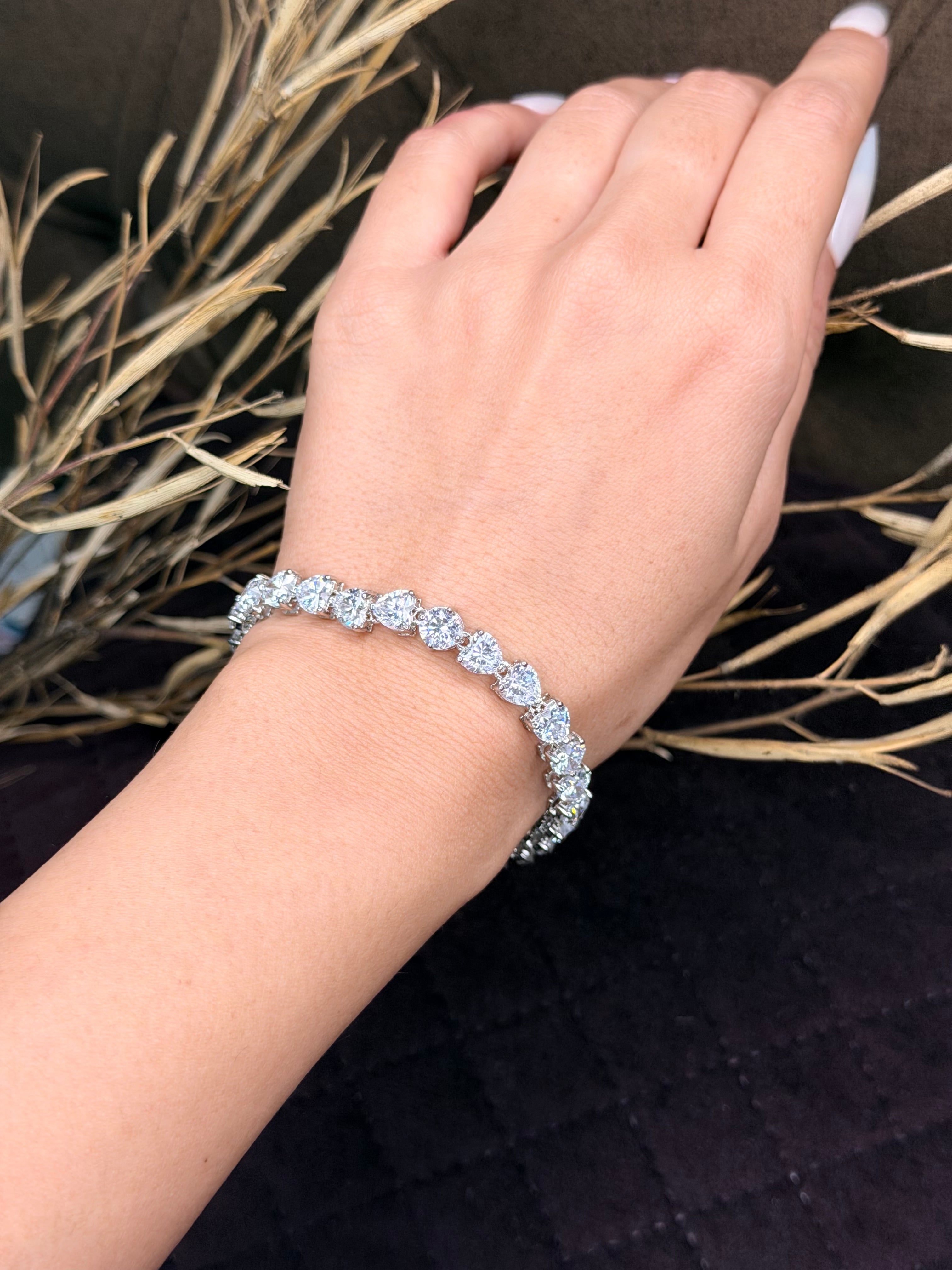 Silver heart shaped diamond tennis bracelet