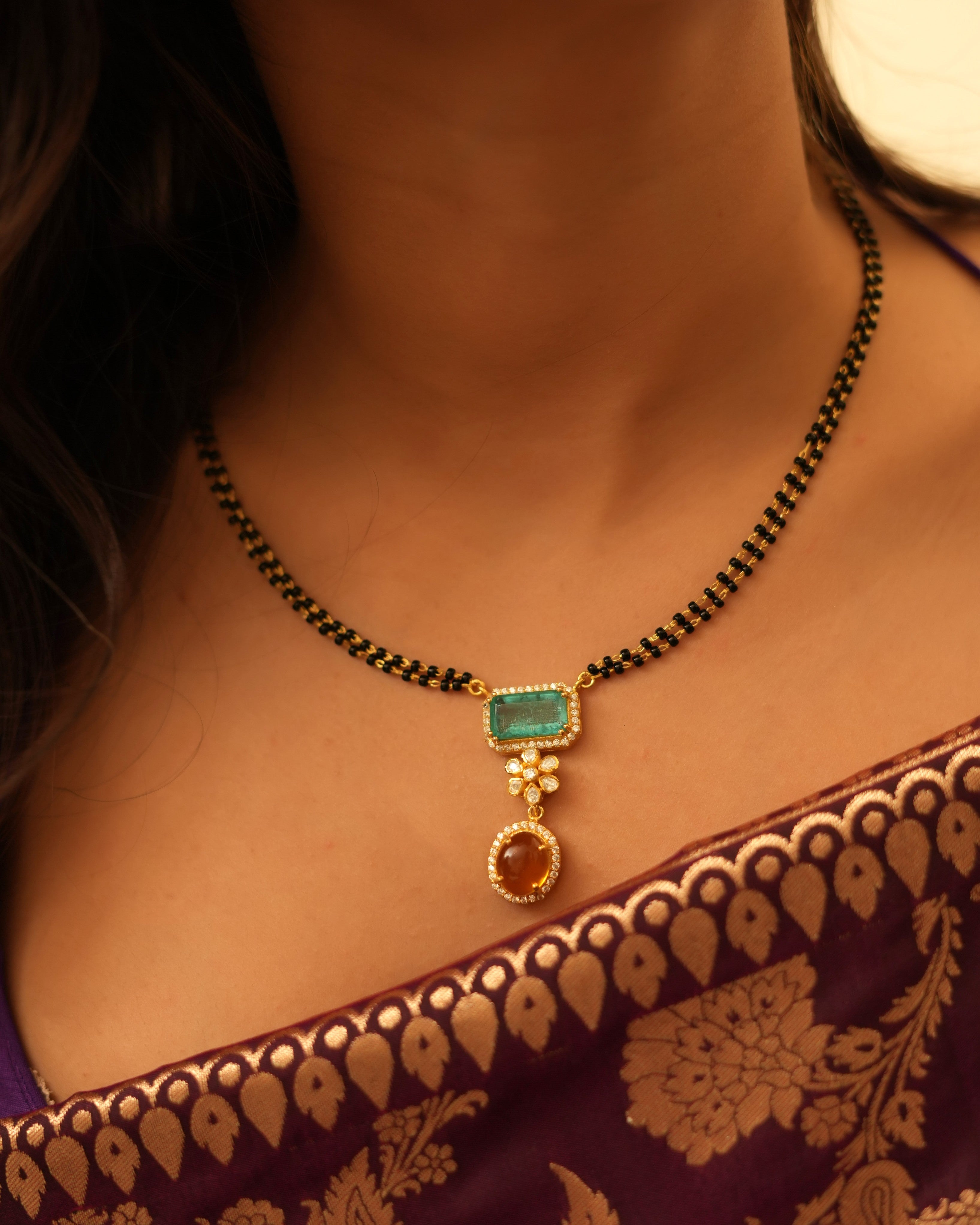 Elegant Polki Mangalsutra with Ruby and Emerald Accents