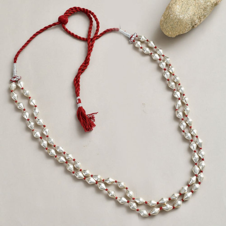Silver dholki necklace