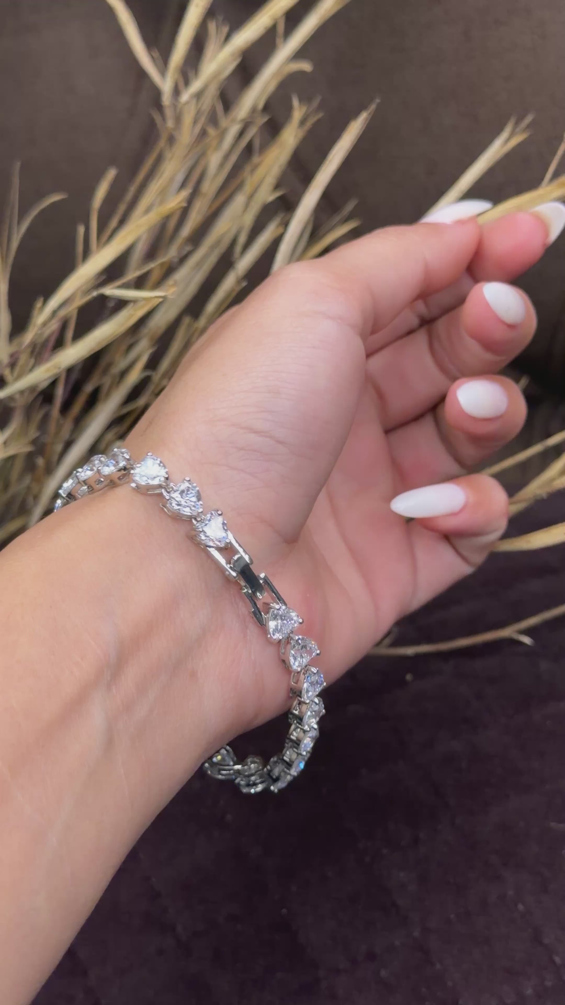 Silver heart shaped diamond tennis bracelet